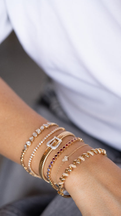 Multishape gold diamond bracelet