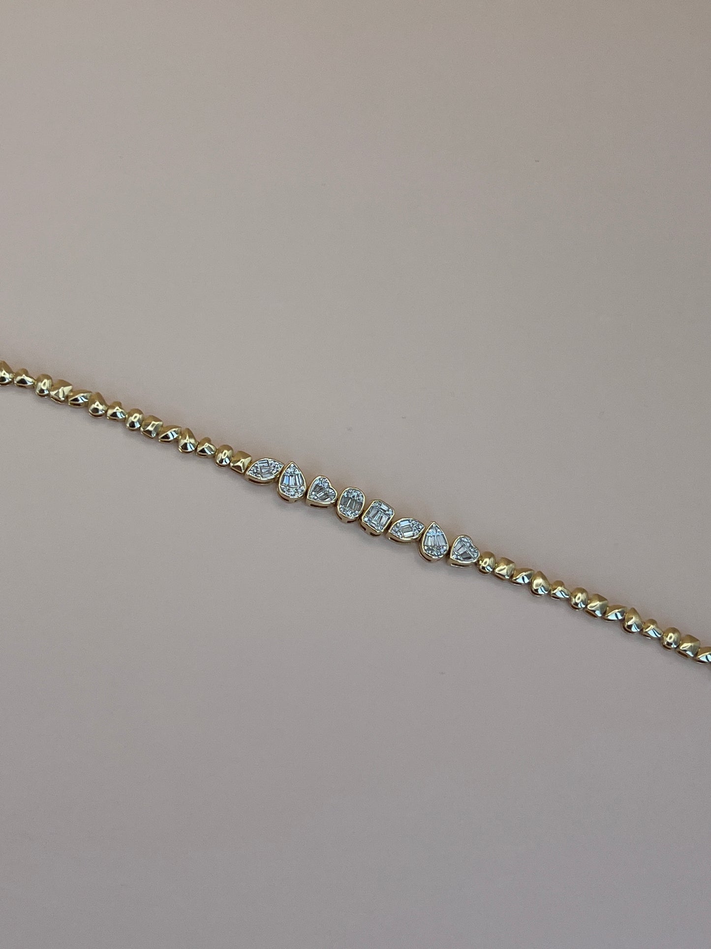 Multishape gold diamond bracelet