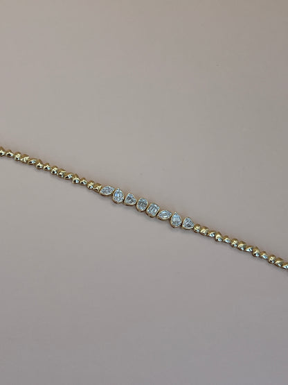 Multishape gold diamond bracelet