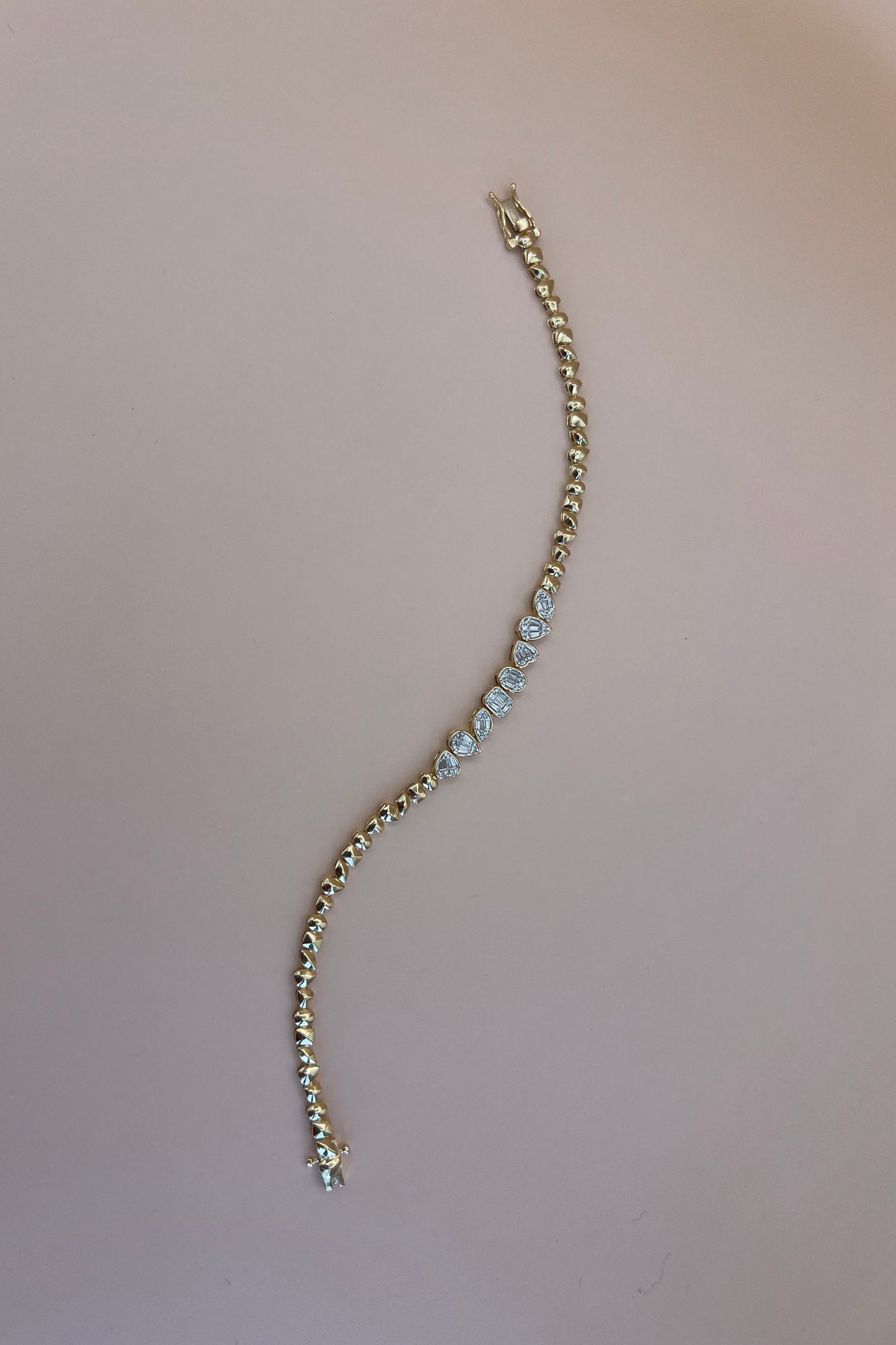 Multishape gold diamond bracelet