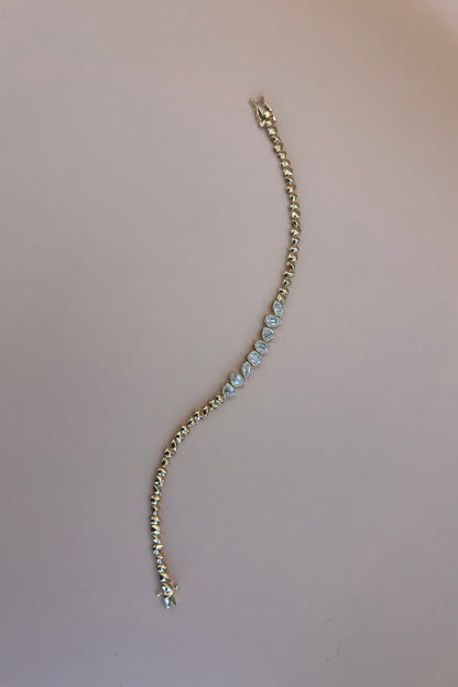 Multishape gold diamond bracelet